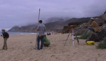 surveying on a beach