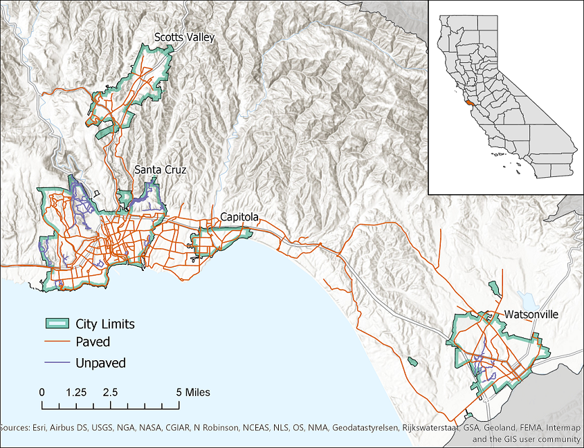 A topographic map of Santa Cruz County, focused on the portion of the county with bicycle infrastructure. Four city limits are highlighted in green. Paved bicycle infrastructures are drawn in orange; unpaved in blue-violet. An inset map in the upper-right corner shows the location of the county within the State of California.